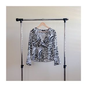 PRETTYLITTLETHING Zebra Print Flare Sleeve Ruffle Top
